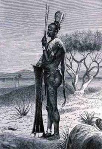 A tattooed Shuli negro with his weapons