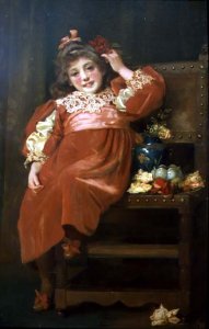 A full length portrait of a pretty young girl in a red dress, reclining in a chair